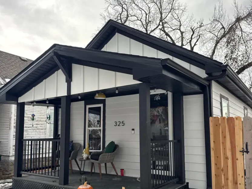 Finished exterior siding and trim restoration on a Lincoln, NE bungalow